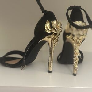 Black sandal heels with gold heel